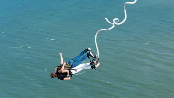 free-photo-of-two-people-bungee-jumping-over-the-sea_1_.jpeg