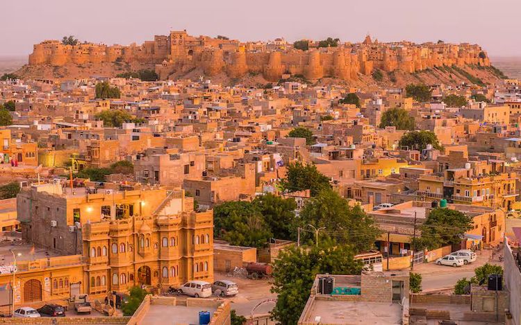 Carved sandstone façade of Patwon Ki Haveli during a private Jaisalmer sightseeing tour