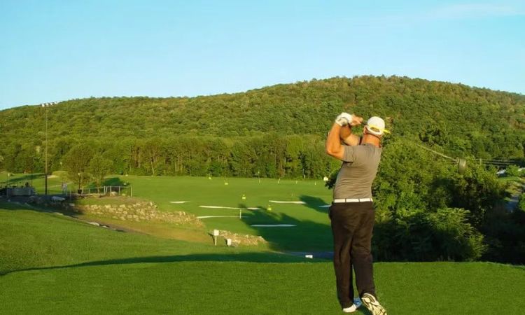 Golfer playing in the quiet surroundings of Black Bear Golf Club