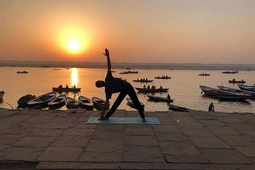 Yoga mat prepared for a private morning class beside Varanasi’s Ganges riverfront